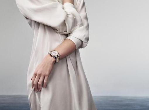 Women are elegant wearing steel and rose golden Omega fake watches.