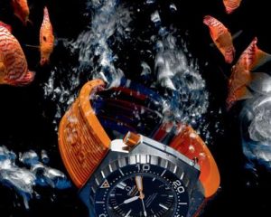 The orange rubber straps fake watches have black dials.